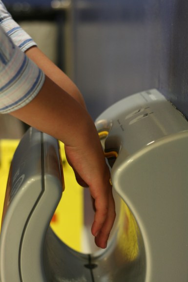 Dyson Hand Dryer with hands.jpg
